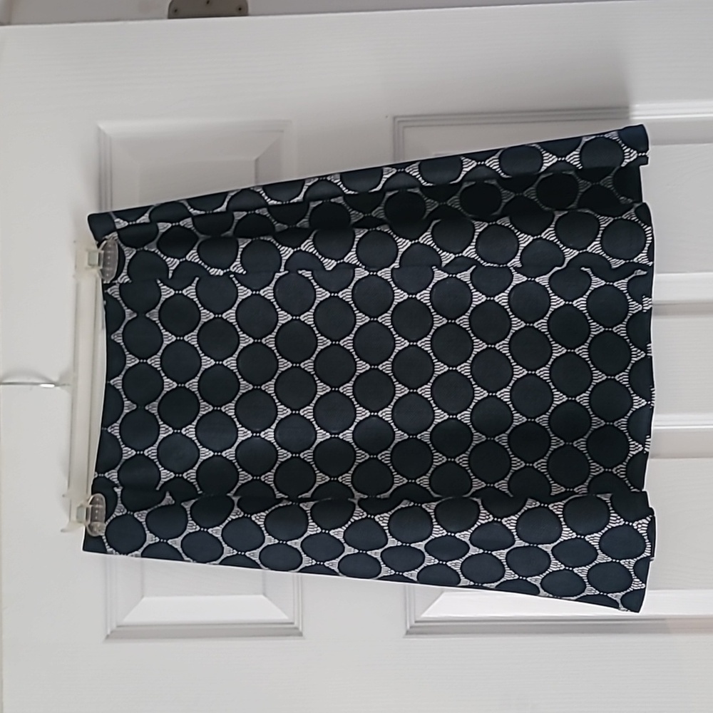 Brand: ReneeC. Dotted Skirt. Navy Blue. Size Small.